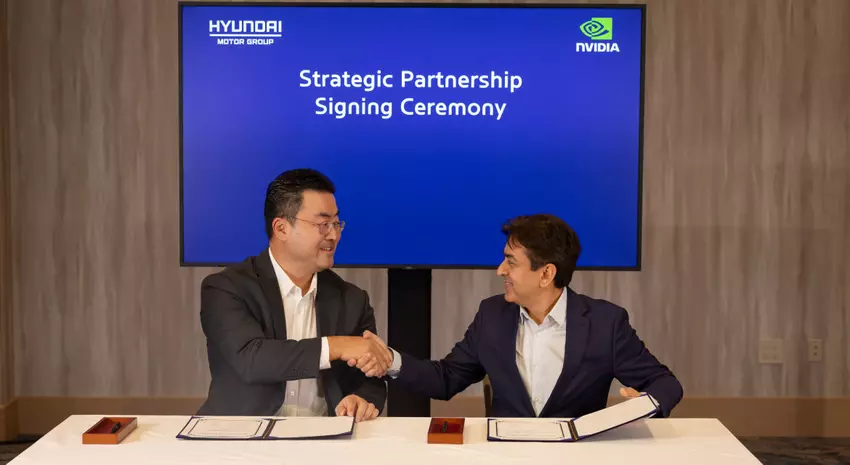 Feierliche Unterzeichnung der Partnerschaft in Las Vegas, Nevada, USA. Von links nach rechts: Heung Soo Kim und Rishi Dhall.