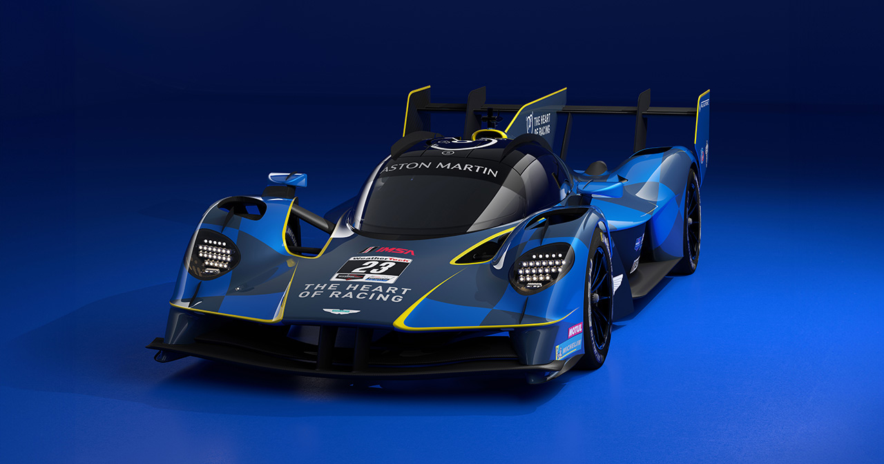 Aston Martin Valkyrie LMH vor der Kulisse einer Rennstrecke Aston Martin Valkyrie LMH vor der Kulisse einer Rennstrecke